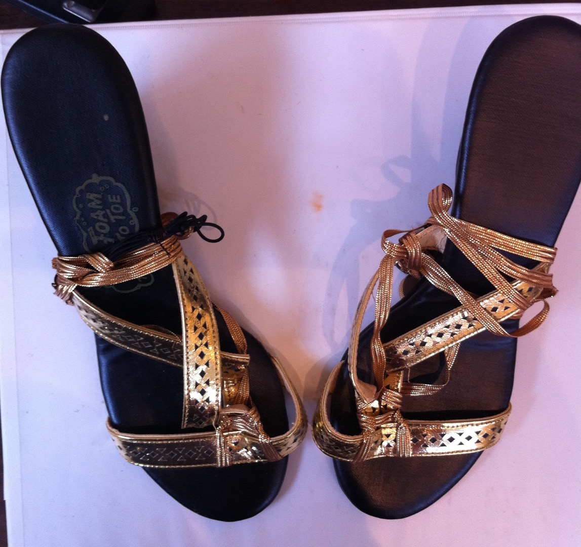 Gold sandals with jeweled clasp