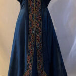Dress, Blue rayon velvet, trimmed with decorative tape, enhanced with faux jewels.