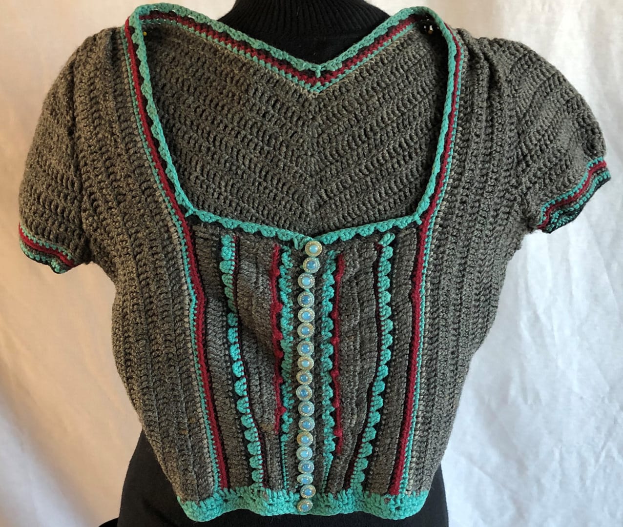 Crocheted pullover sweater, teal detail on dark gray