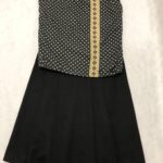 Black skirt and black patterned top