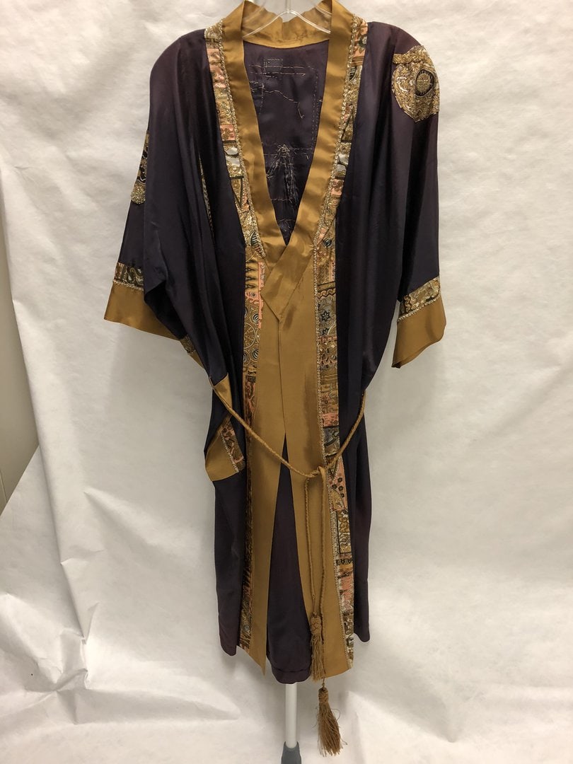 Dark robe with gold trim